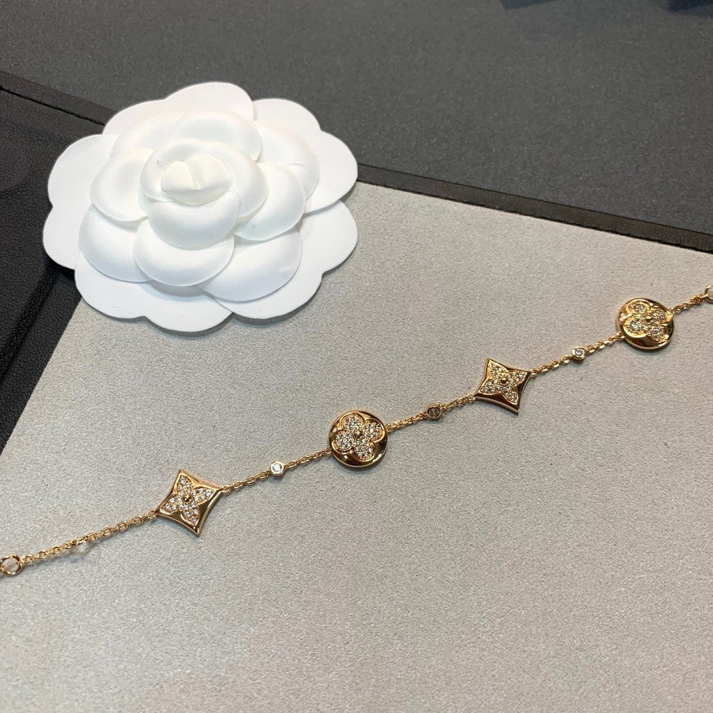 ¡®Imperial¡¯STAR AND SUN 4 MOTIFS GOLD DIAMONDS BRACELET