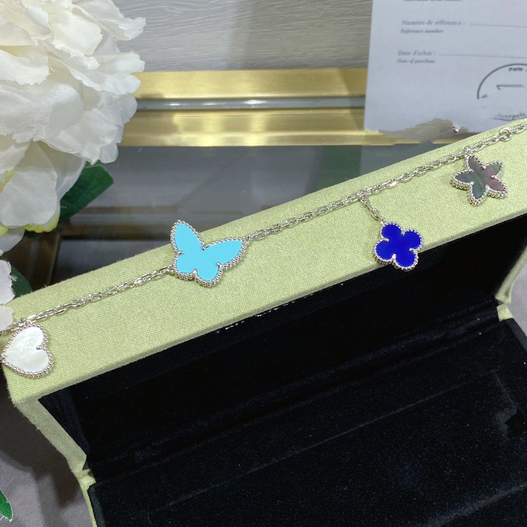 ¡®Imperial¡¯LUCKY SPRING SILVER BRACELET 4 MOTIF